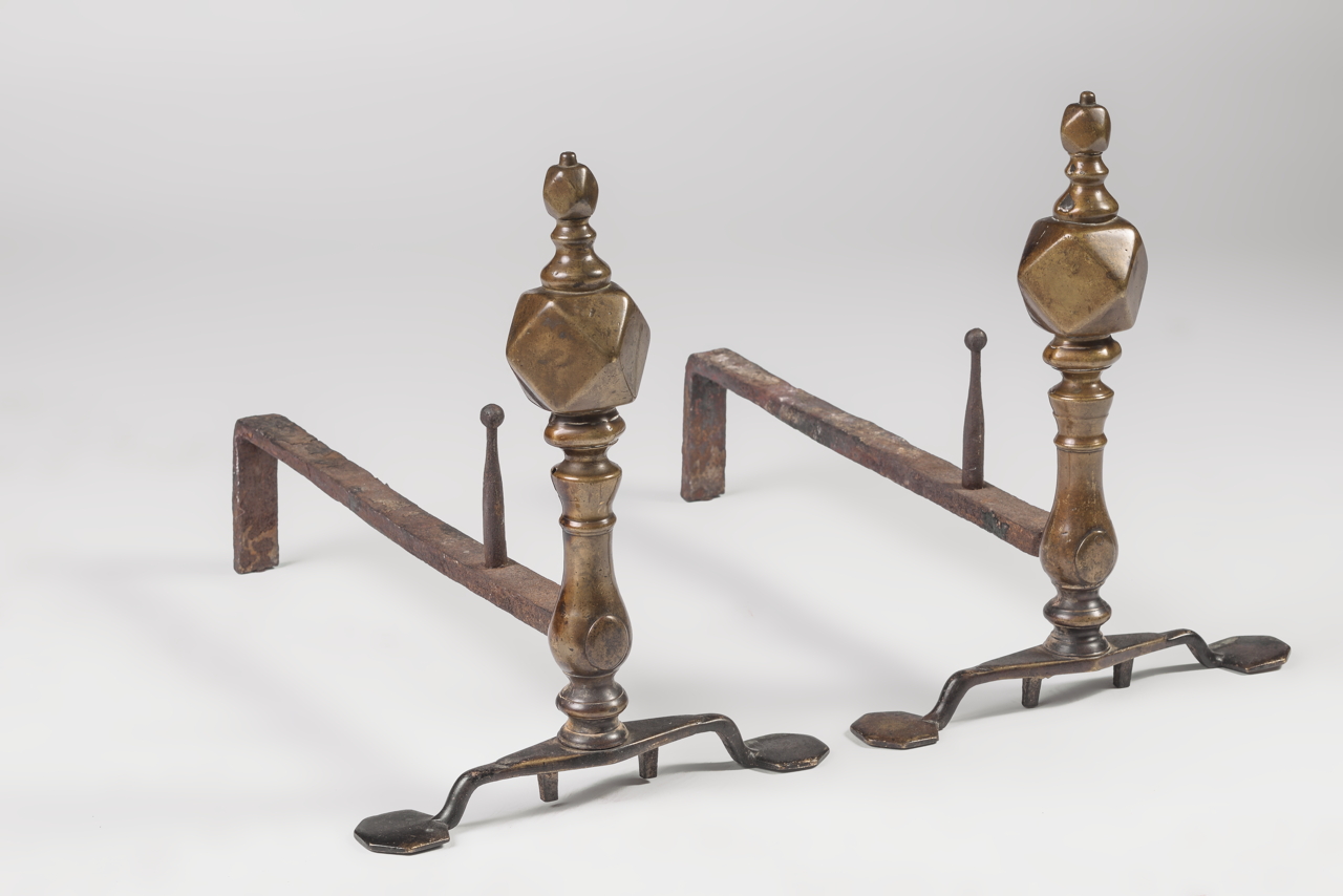 A fine and rare pair of brass andirons